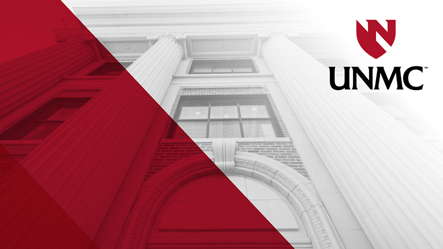 Grayscale upward view of Wigton's columns, overlaid by a transparent red frame in the left side and UNMC logo top right. 
